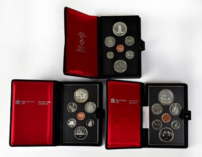 Lot 582 - Three Royal Canadian Mint year packs, 1977,...