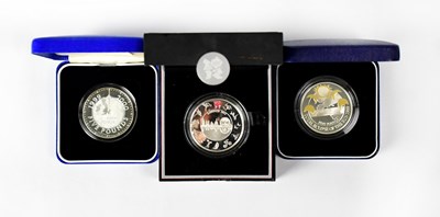 Lot 632 - Three silver £5 coins, comprising Alderney...