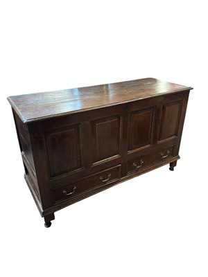 Lot 93 - An 18th century oak coffer, with panelled...