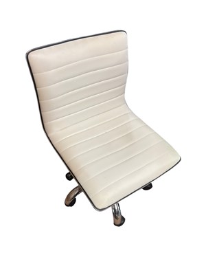 Lot 18 - A contemporary cream leather effect swivel...