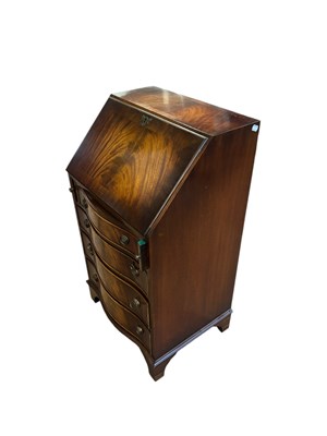 Lot 82 - A reproduction serpentine front bureau, the...