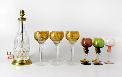 Lot 270 - A set of six wheel cut amber glass wine...