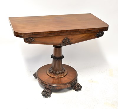 Lot 2 - A Georgian mahogany fold-over card table, with...