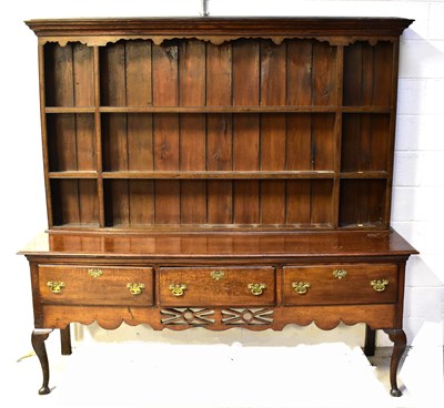 Lot 114 - An 18th century oak dresser with three-section...