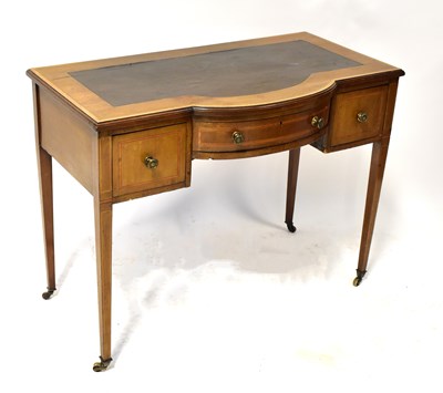 Lot 118 - A mahogany leather-topped desk, with large bow-...