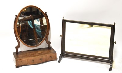 Lot 143 - Two swivel toilet mirrors, one with...