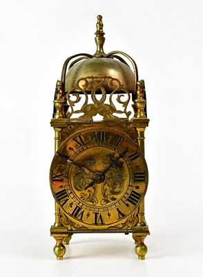 Lot 180 - A reproduction brass-cased lantern clock with...