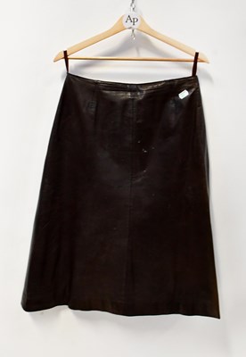 Lot 365 - Three three-quarter length leather A-line...