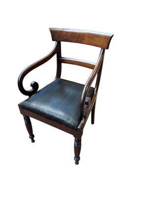 Lot 301 - A 19th century mahogany elbow chair.