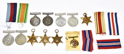 Lot 317 - A group of medals, including two WWI medals...