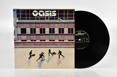 Lot 1076 - OASIS; two albums comprising (What's The...