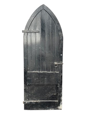 Lot 113 - An old black painted Gothic Revival door,...