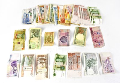 Lot 536 - A collection of world banknotes to include...