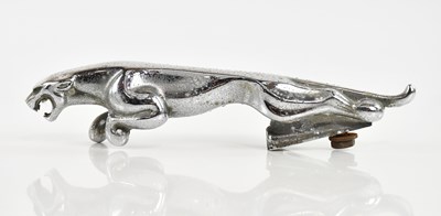 Lot 530 - A vintage chrome Jaguar car mascot, length 17cm.