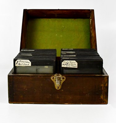 Lot 343 - A collection of glass magic lantern slides,...