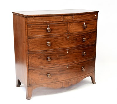 Lot 12 - A Victorian mahogany bow-fronted chest with...