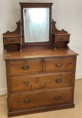 Lot 448 - A pine dressing chest of two over two drawers...