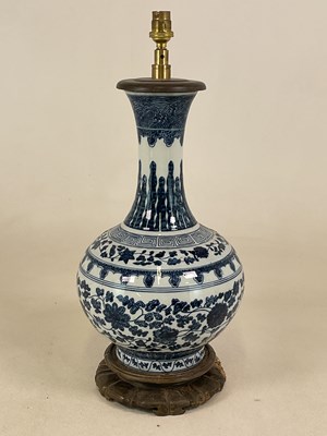 Lot 254 - A modern Chinese blue and white vase converted...