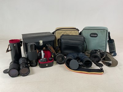 Lot 315 - A quantity of cameras, lenses and a pair of...