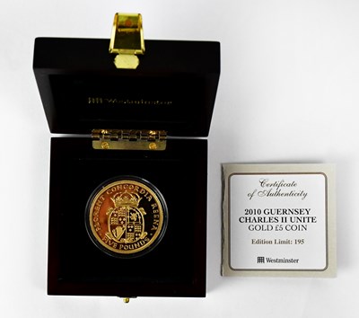 Lot 694 - An Elizabeth II Guernsey gold proof £5 coin,...