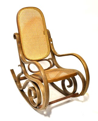 Lot 31 - A bentwood rocking chair with bergère seat and...