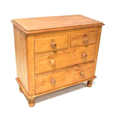 Lot 69 - A Victorian pine chest of two short over two...