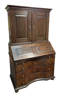 Lot 85 - An 18th century North European oak bureau...