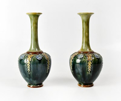 Lot 227 - ROYAL DOULTON; a pair of onion-shaped vases...