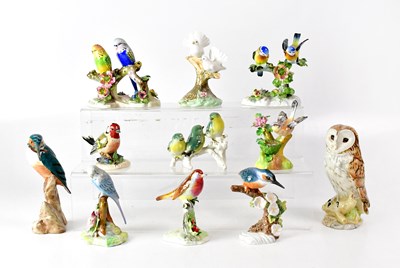 Lot 217 - Eleven various porcelain models of birds,...