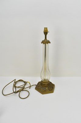 Lot 164 - A 20th century cut glass and brass table lamp,...