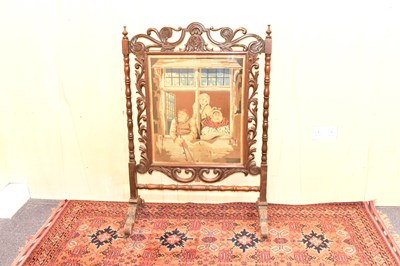 Lot 126 - A large Victorian oak tapestry fire screen,...