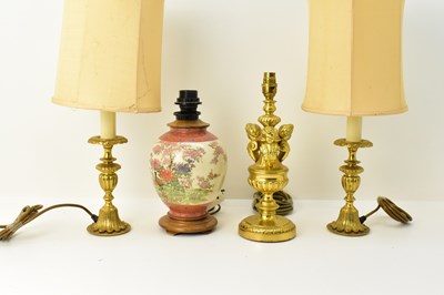 Lot 172 - A pair of brass floral table lamps with shades,...