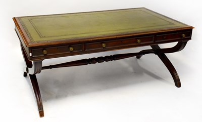 Lot 34 - A large mahogany framed writing table with...