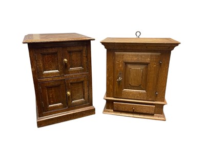 Lot 114 - An oak wall cupboard, with panelled door and...