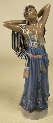 Lot 127 - DAHL JENSEN FOR COPENHAGEN; a porcelain figure...