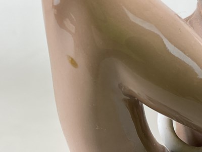 Lot 127 - DAHL JENSEN FOR COPENHAGEN; a porcelain figure...