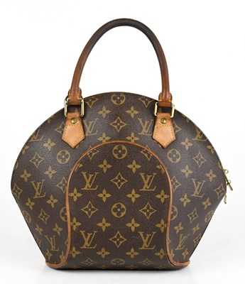 Lot 678 - LOUIS VUITTON; a monogrammed canvas coated...