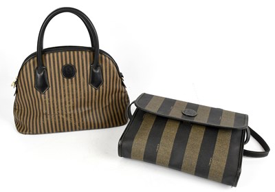 Lot 679 - FENDI; a black and brown pequin striped coated...