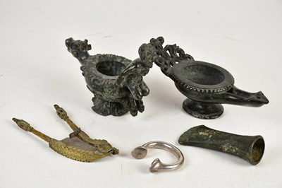 Lot 582 - Two carved hardstone Roman style oil lamps,...