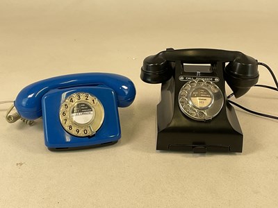 Lot 14 - A black GPO 312L telephone with pullout drawer,...