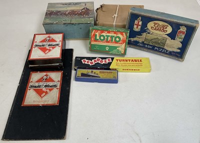 Lot 71 - A group of toys including board games and jig...