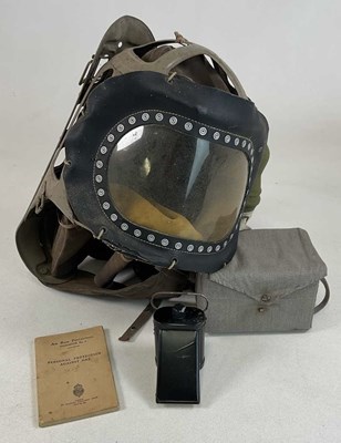 Lot 57 - World War Two infants and adults gas mask,...