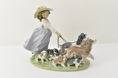 Lot 205 - LLADRÓ; a porcelain figure, 'Puppy Parade',...