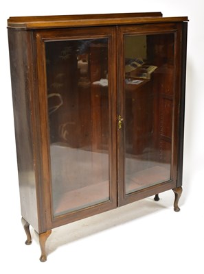 Lot 88 - An early 20th century mahogany two-door...