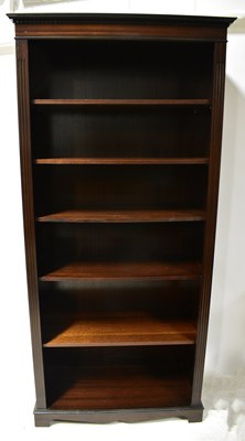 Lot 90 - A reproduction mahogany open free-standing...