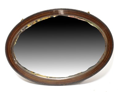 Lot 137 - An early 20th century mahogany framed oval...