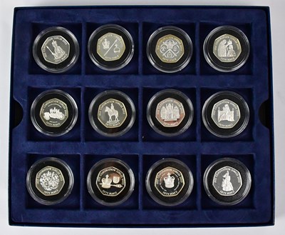 Lot 611 - Twelve silver proof 50p coins, 'The Royal Mint...