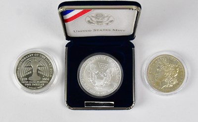 Lot 626 - Three silver US dollars, comprising an 1890...