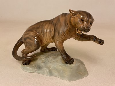 Lot 200 - BESWICK; puma standing on a rock, model number...