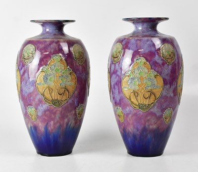 Lot 226 - ROYAL DOULTON; a pair of Art Nouveau stoneware...